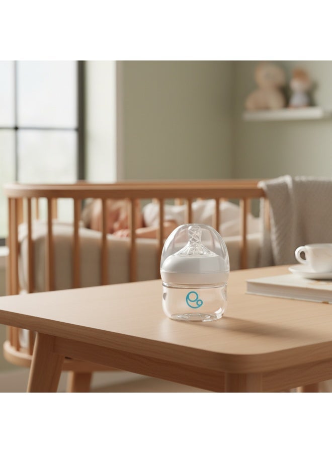 أمومي زجاجات رضاعة للأطفال حديثي الولادة، زجاجات مضادة للمغص مصنوعة من البولي بروبيلين، حلمة من مطاط السيليكون، حلمة عريضة تشبه حلمة الثدي، تدفق بطيء، لون أبيض، 60 مل - Image 4